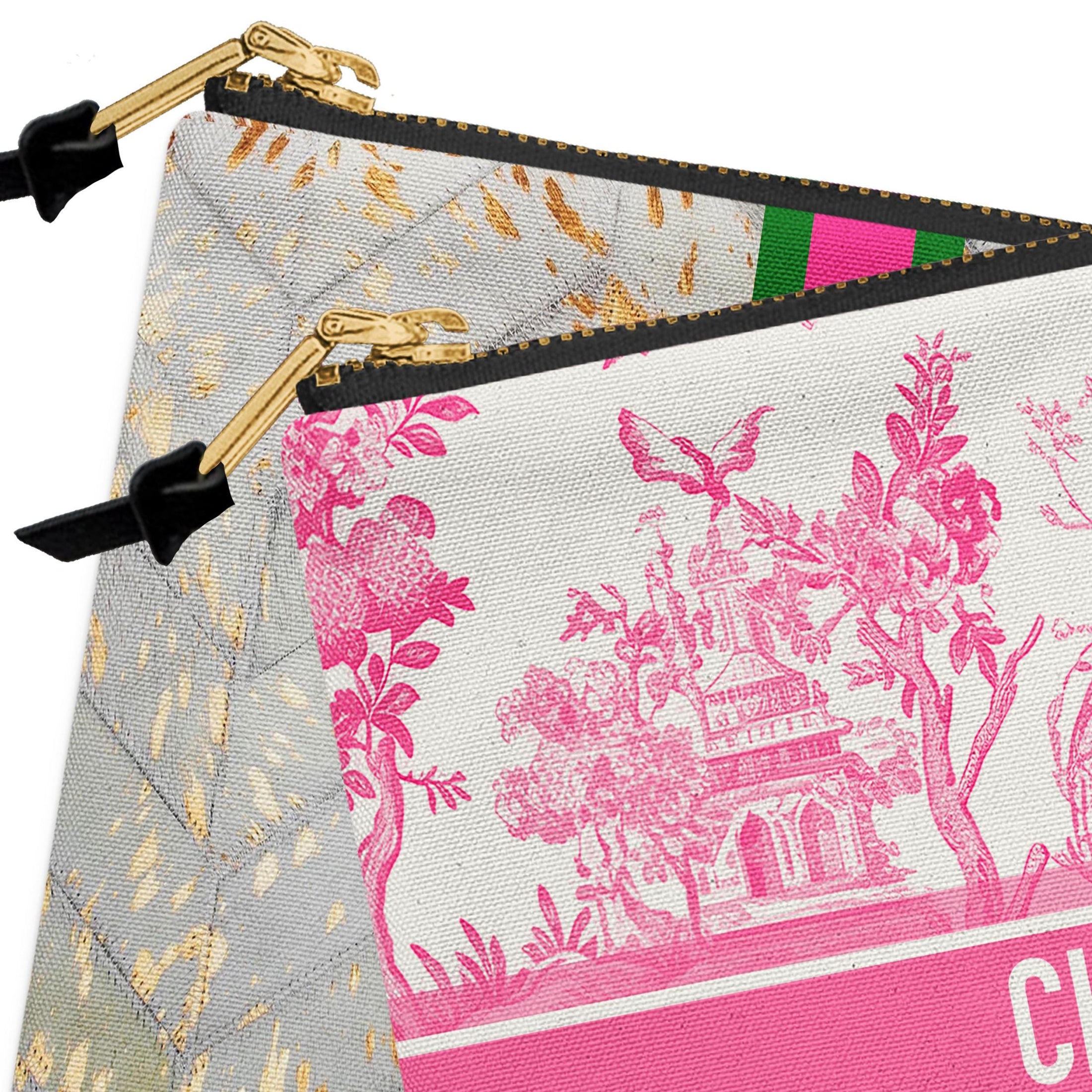 a zippered bag with a pink and white floral design, including a temple or pagoda.